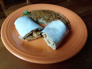 An Indian omelette and breakfast burrito.