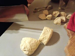 Preparing bao for steaming.