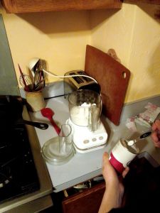 Preparing the pie crust dough in a food processor.