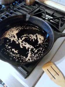 Yellow mustard seed in oil.