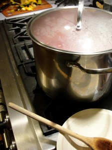 Simmer the pork, covered.